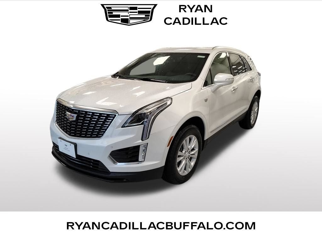 2026 Cadillac XT5 Luxury in Crystal White Tricoat — front three-quarter view