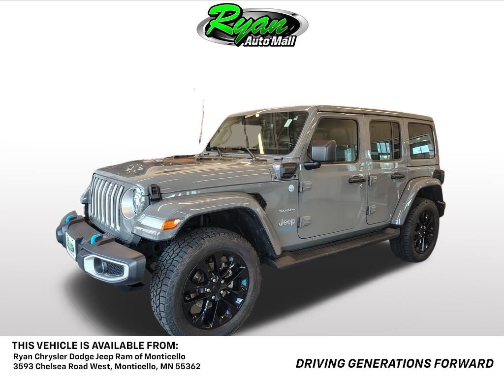 2022 Jeep Wrangler Unlimited Sahara 4xe in Sting-Gray Clearcoat — front three-quarter view