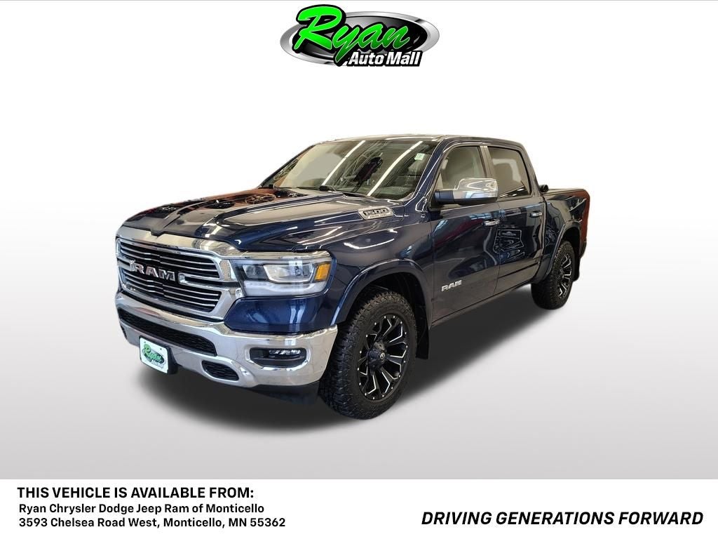2022 RAM 1500 Laramie in Patriot Blue Pearlcoat — front three-quarter view