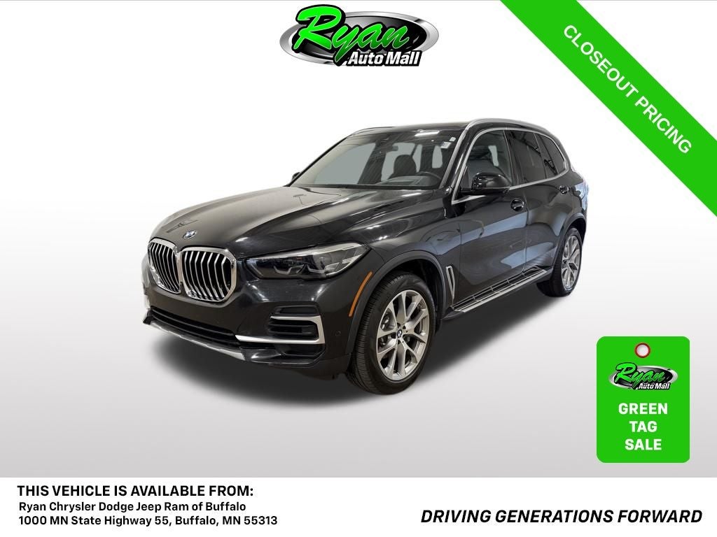 2023 BMW X5 xDrive40i in Black Sapphire Metallic — front three-quarter view