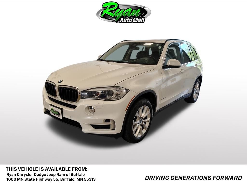 2016 BMW X5 xDrive35i in Alpine White — front three-quarter view