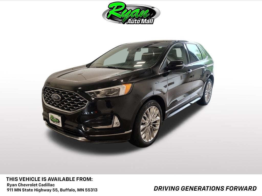 2020 Ford Edge Titanium in Agate Black — front three-quarter view