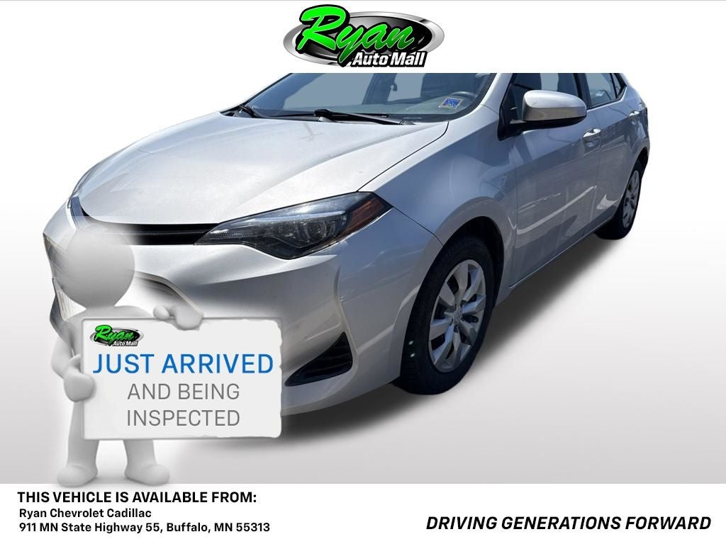 2018 Toyota Corolla LE in Classic Silver Metallic — front three-quarter view
